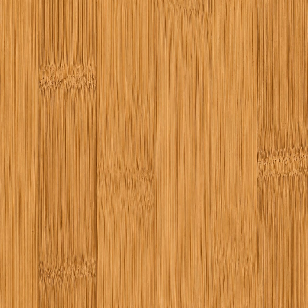 Close-up of natural solid bamboo flooring showing its linear grain and nodes